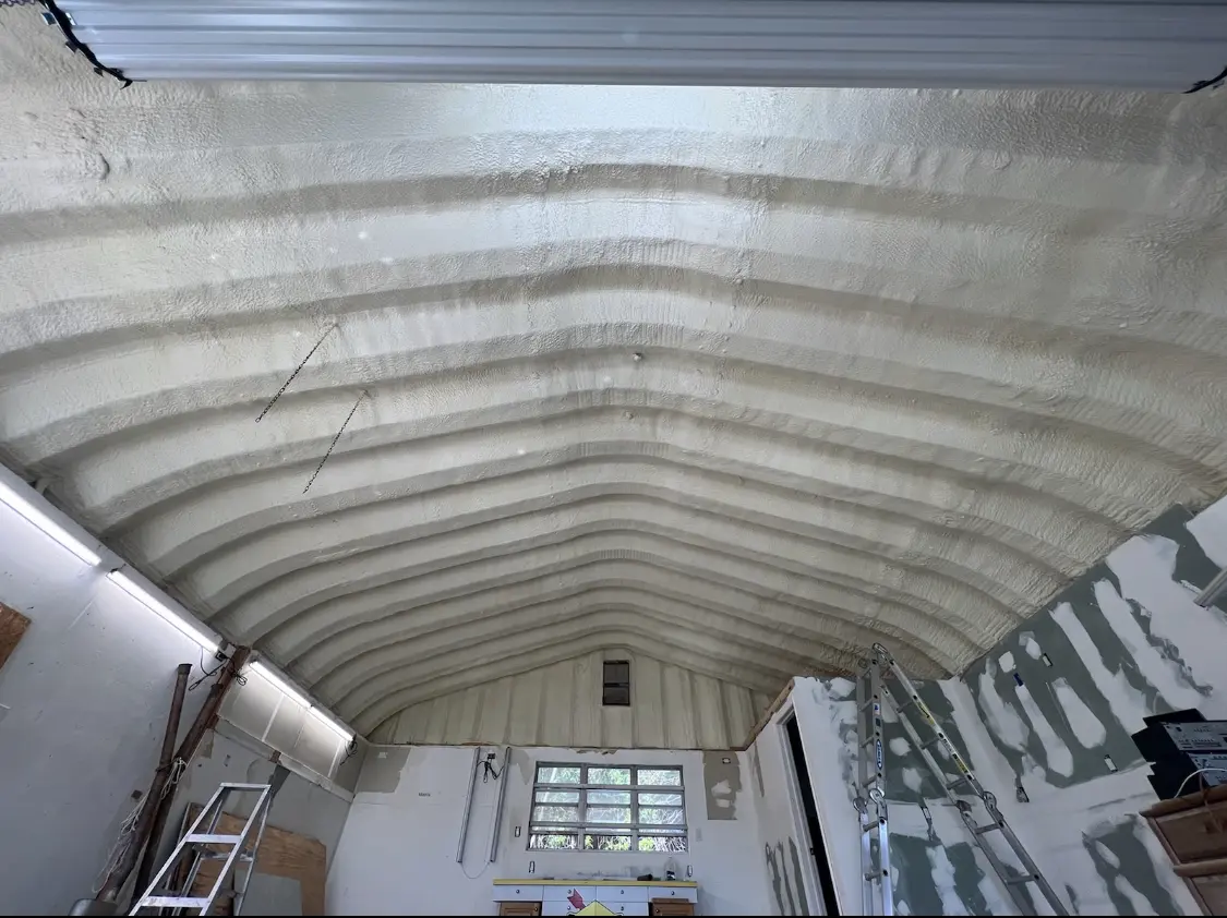 Spray polyurethane foam applied to the underside of a metal roof deck in Crouch Mesa